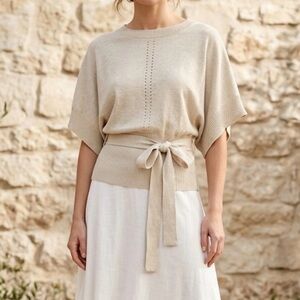 Women's cream-colored blouse.